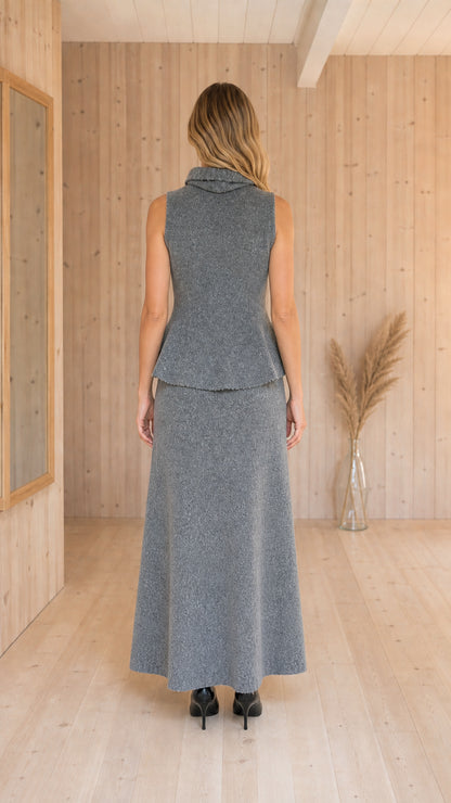 Back view of Heather Grey two-piece knit peplum top and maxi skirt