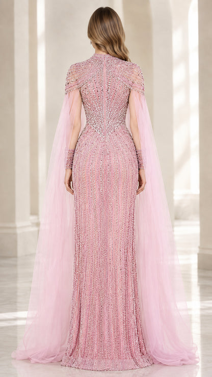 Back view of dusty pink floor-length evening gown with flowing cape