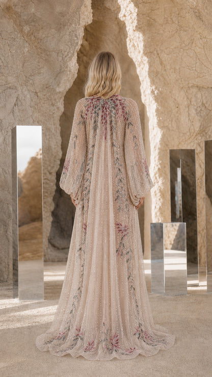 Back view of Champagne evening gown showing flowing sweep train