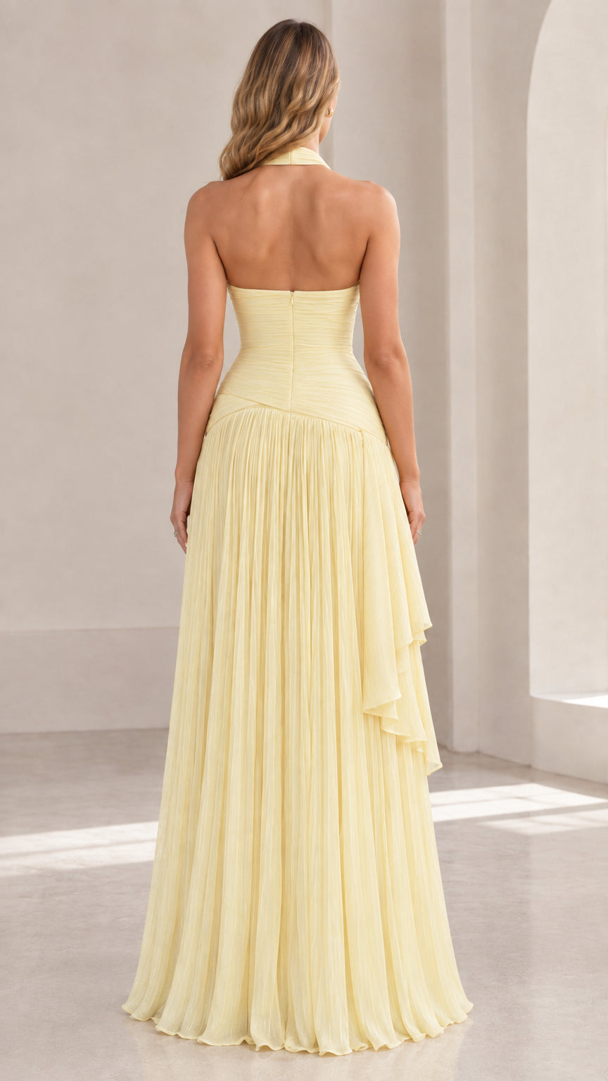 Back view of Butter Yellow open-back halter evening dress showing zip closure