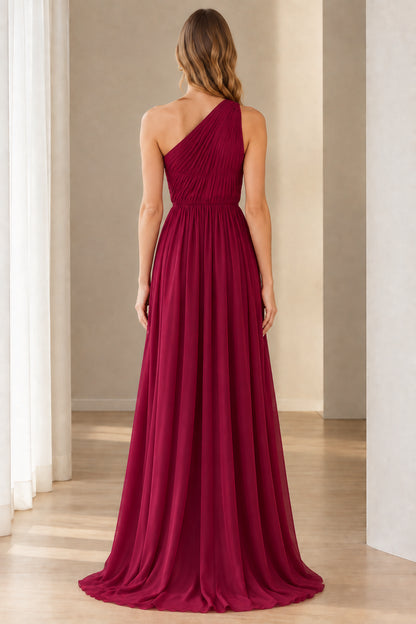 Back view of burgundy asymmetrical pleated chiffon evening gown