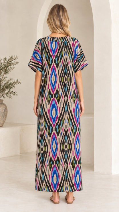 Back view of woman wearing Beige Multi geometric pattern maxi dress