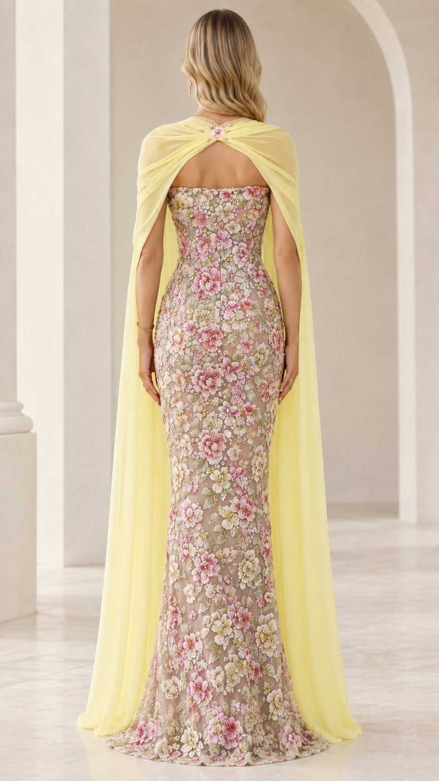 Pastel yellow floral embroidered evening gown back view with sheer cape