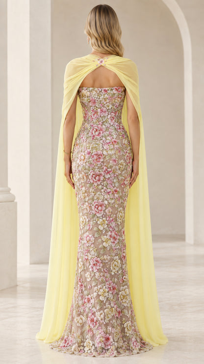 Pastel yellow floral embroidered evening gown back view with sheer cape