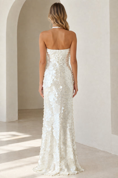 Back view of white halter open-back sequin evening gown