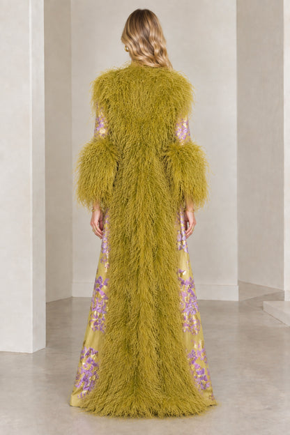 Back view of olive green floral brocade duster coat showing textured feather trim detailing