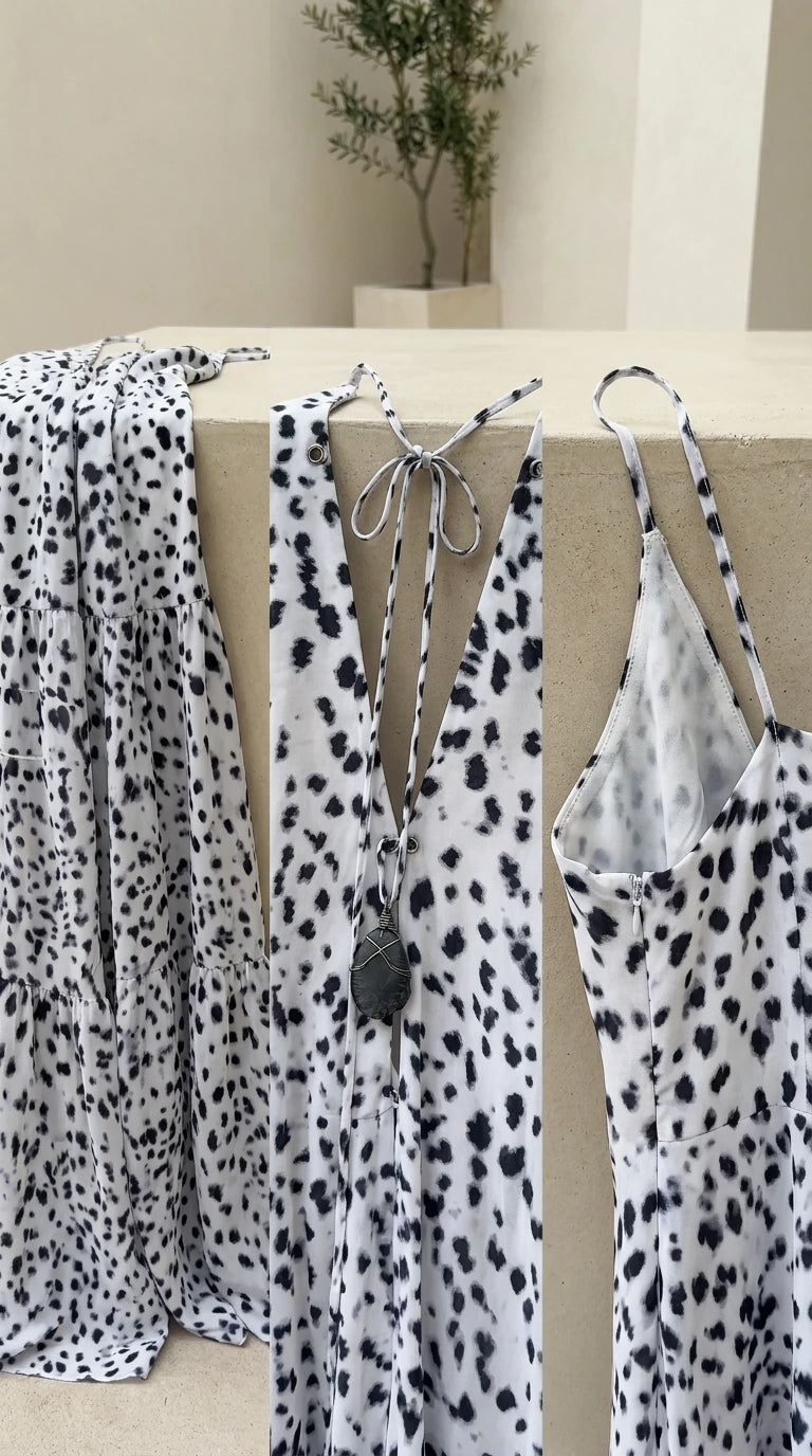 Close-up detail of spotted fabric pattern and front tie tassel