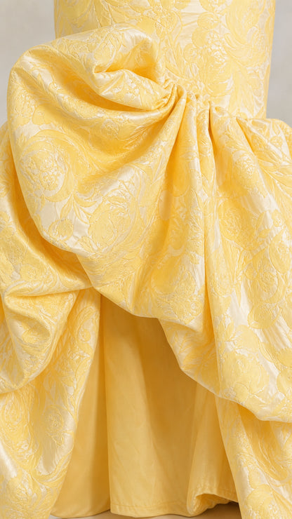 Close-up detail of gathered floral brocade bubble skirt hemline