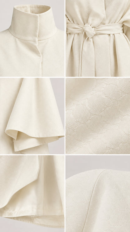 Close-up details of collar, belt tie, and fabric texture of cape set