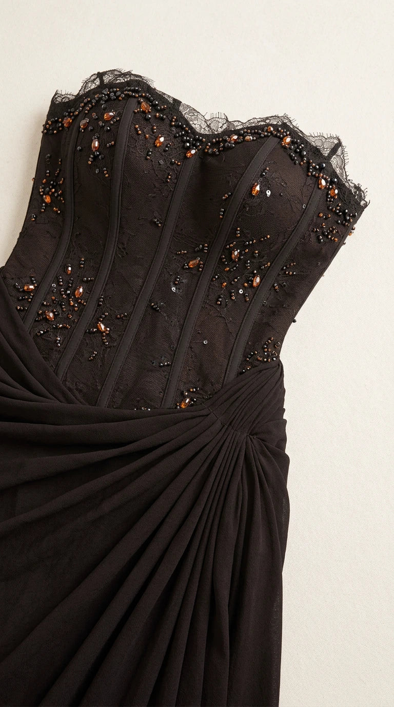 Close-up detail of beaded corset bodice with boning and lace trim