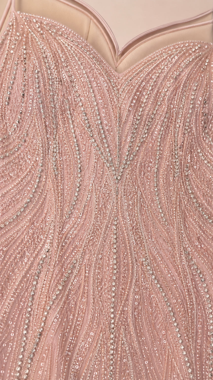 Close-up of beaded and sequined fabric detail