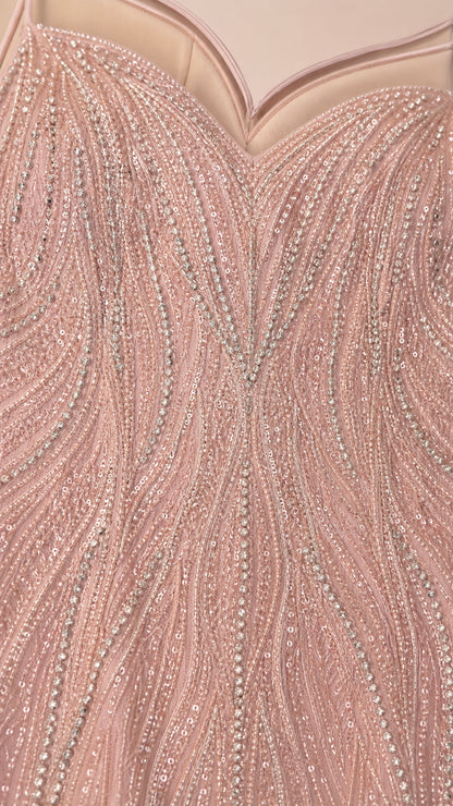 Close-up of beaded and sequined fabric detail
