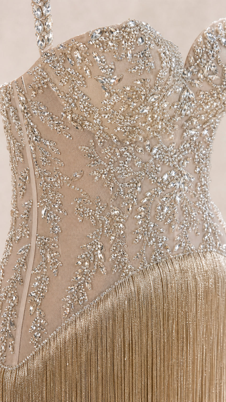 Close-up detail of rhinestone and crystal bodice embellishments