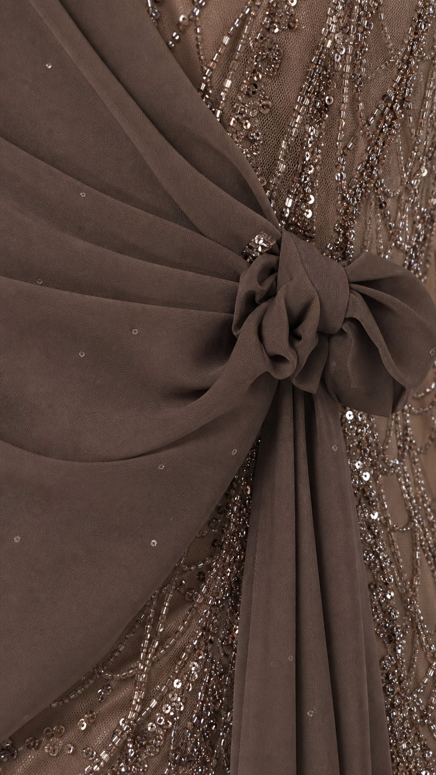 Close up detail of sequin beadwork and waist knot on gown