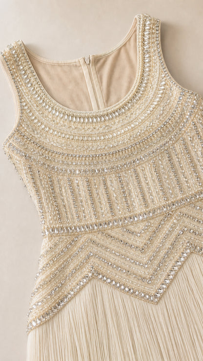 Close-up detail of rhinestone bodice and scoop neckline on Champagne dress