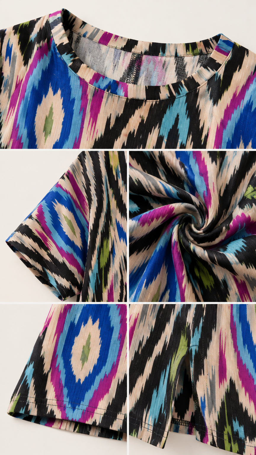 Close-up details of neckline, sleeve, fabric texture, and side hem slit