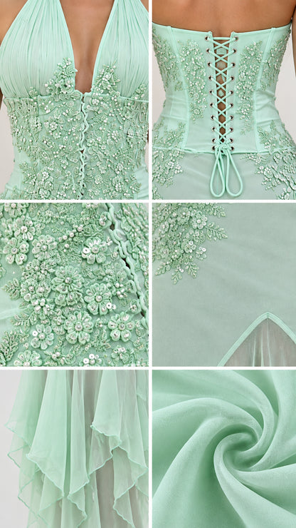 Close-up details of mint green dress showing beaded floral embroidery and fabric texture