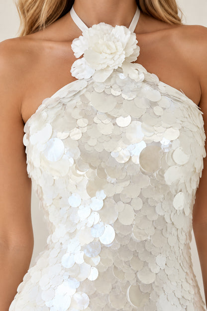 Close-up detail of 3D rosette neckline and white paillette sequins