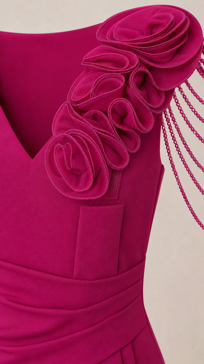 Close-up of shoulder with 3D roses and beaded fringe details