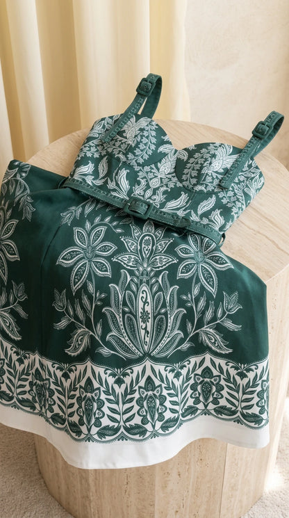Close-up detail of Emerald Green floral pattern, bodice, and matching belt