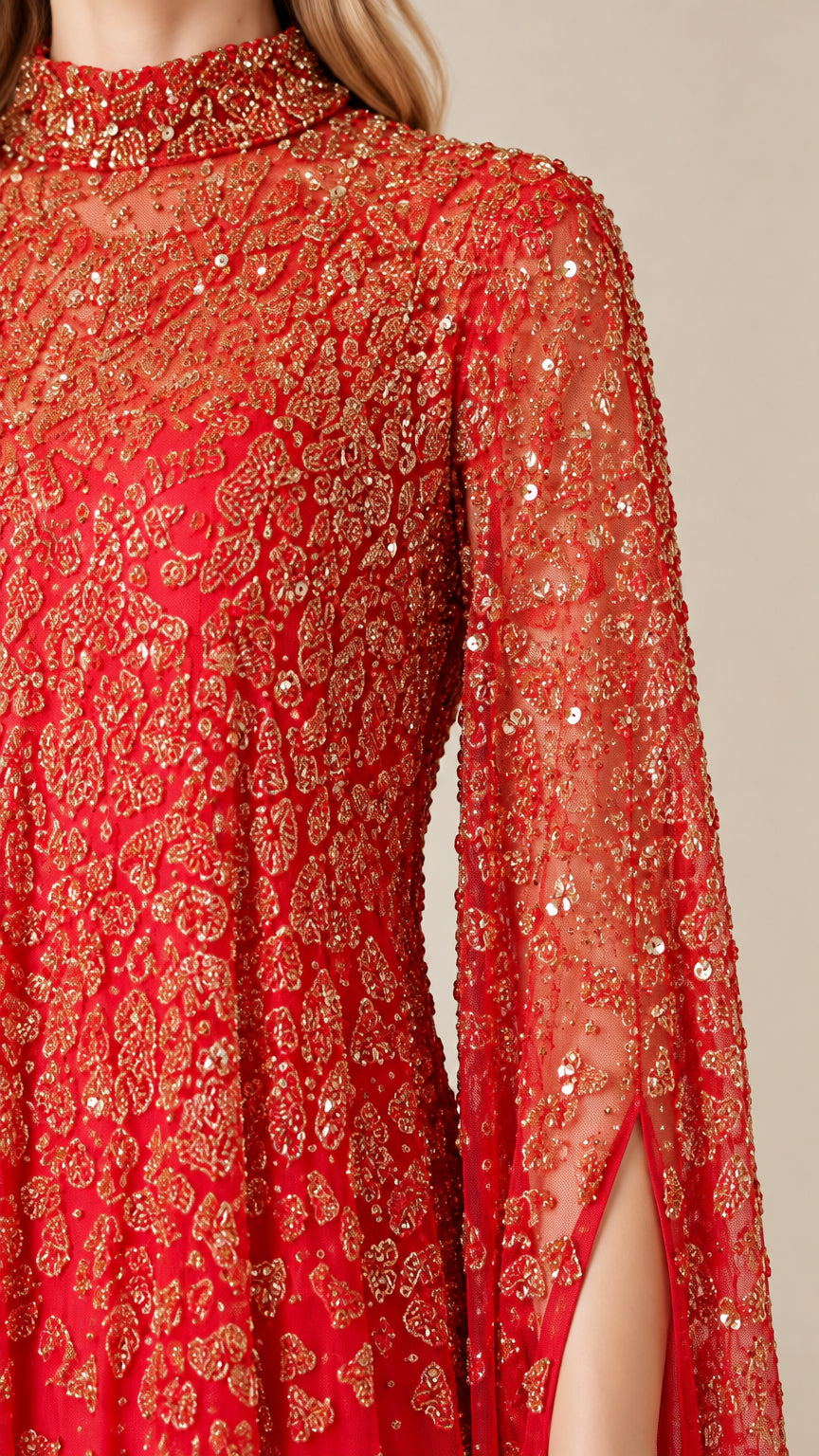 Close-up detail of intricate gold sequin embellishments on red high neck gown