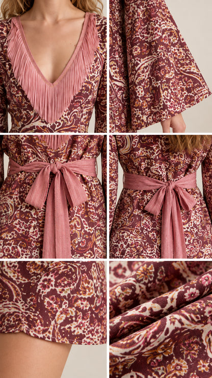 Close-up details of plisse neckline, flared bell sleeves, waist tie, and paisley fabric texture