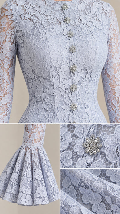 Close-up detail of lace texture and crystal buttons on the bodice and cuff