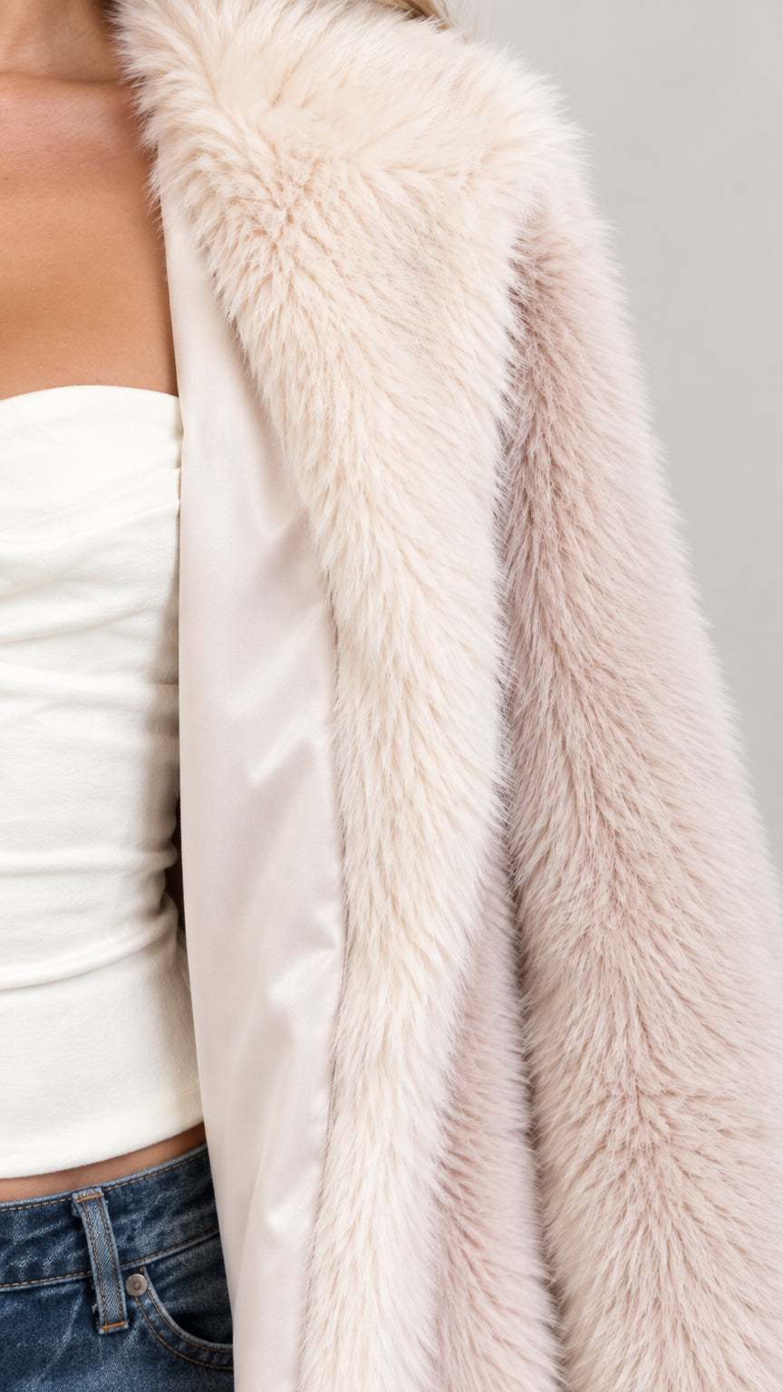 Close-up detail of soft faux fur collar and smooth interior lining