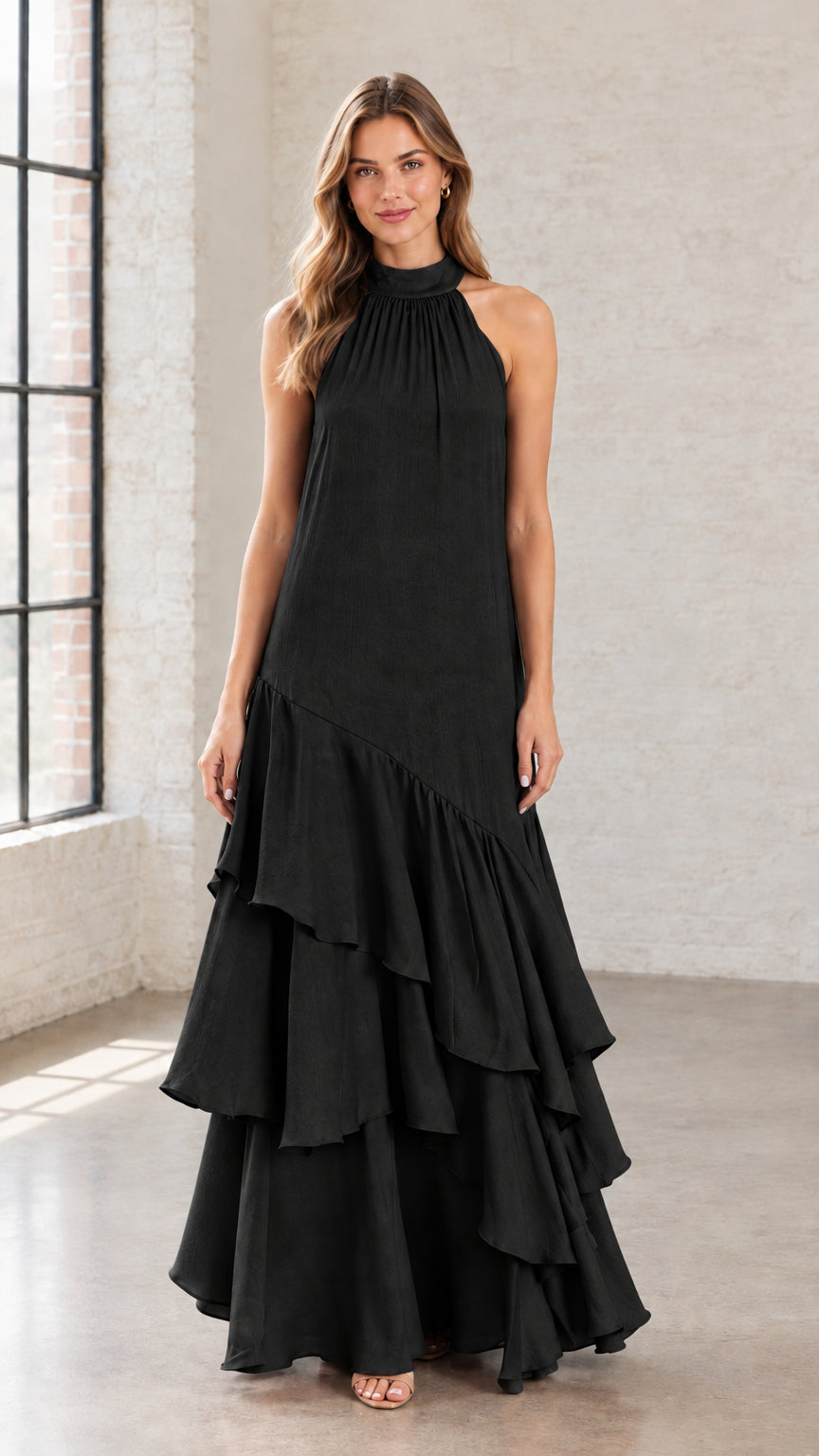 Front view of black halter neck tiered ruffle evening maxi dress