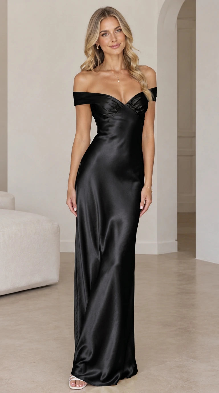 Front view of woman wearing black off-the-shoulder satin maxi gown