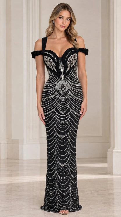 Black floor-length beaded evening gown with silver scalloped embellishments