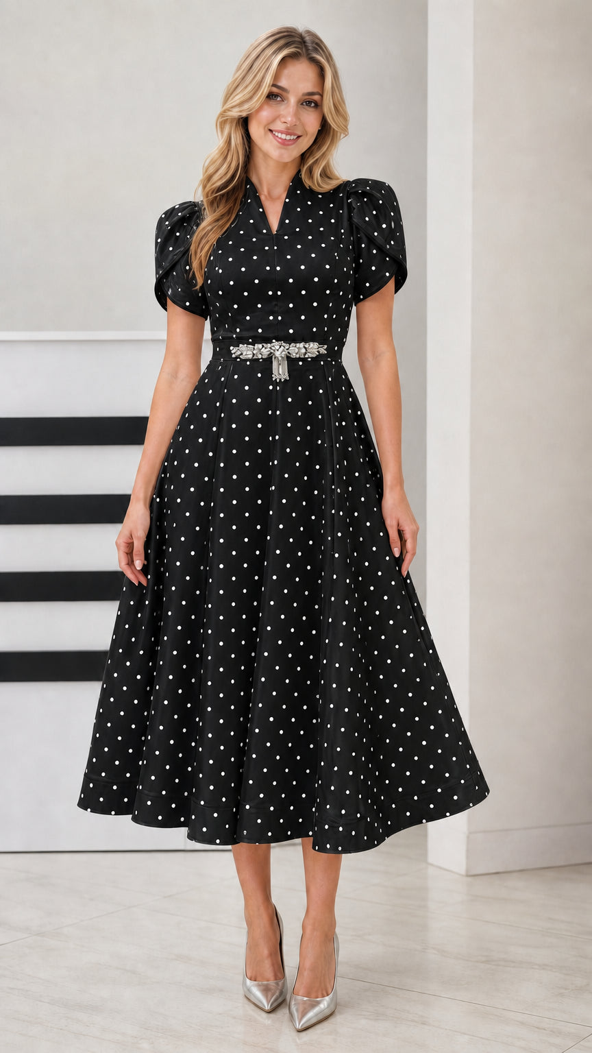 Front view of woman wearing Black polka dot V-neck flared midi dress