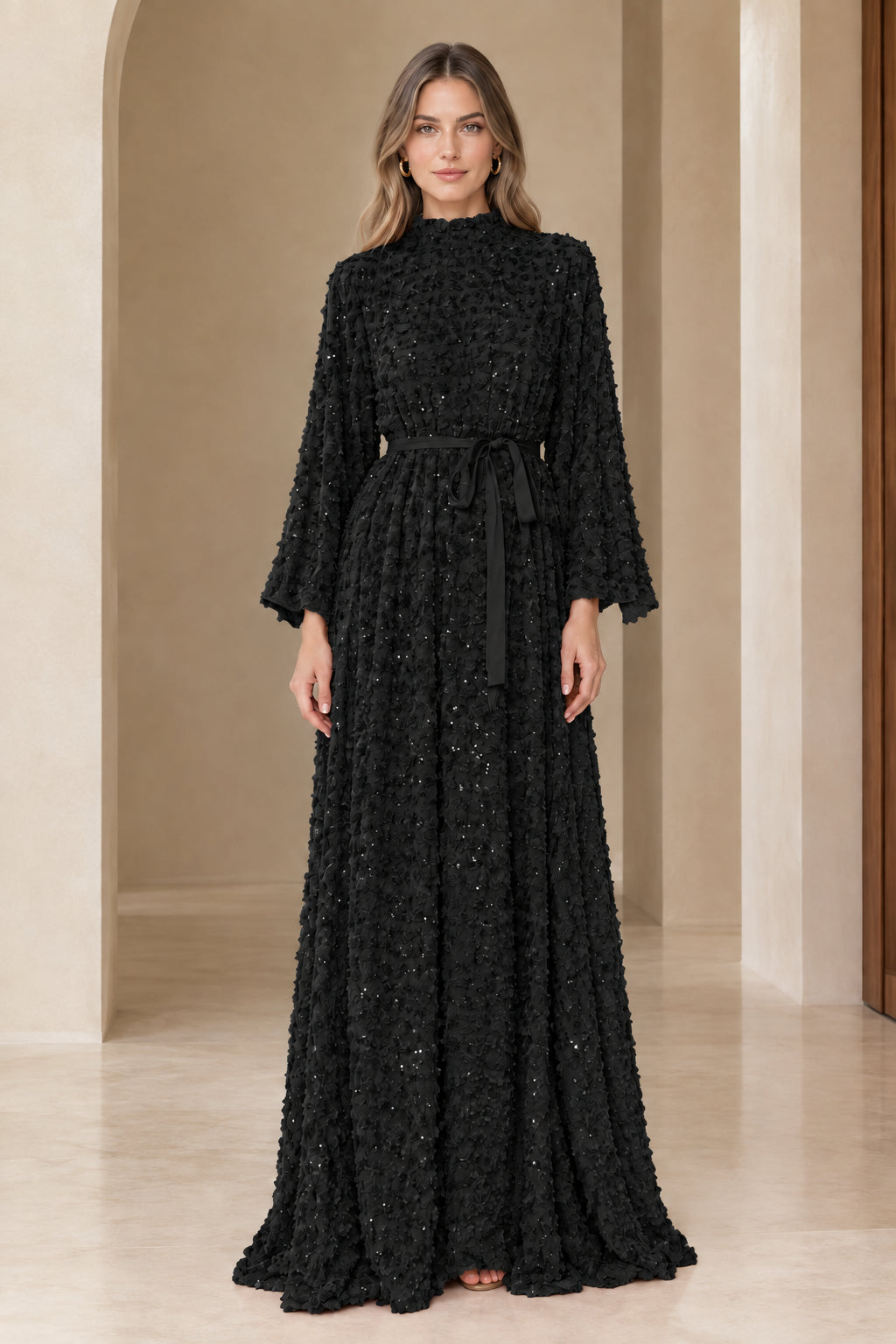 Front full view of black textured sequin long bell sleeve maxi dress