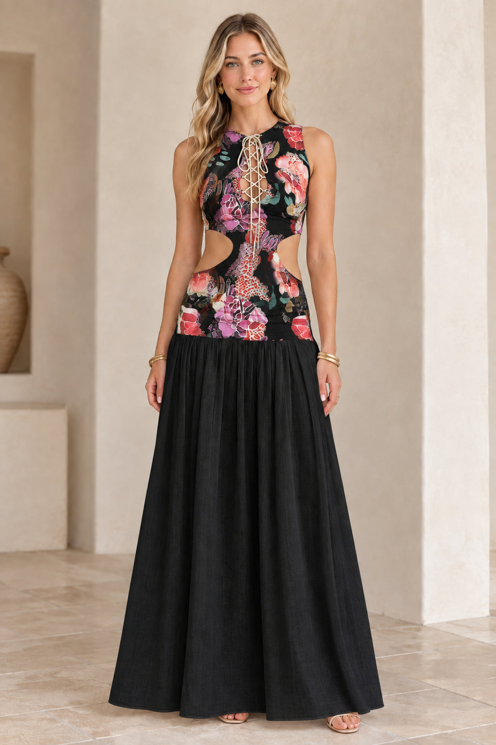 Model wearing Black floral cutout lace-up maxi dress