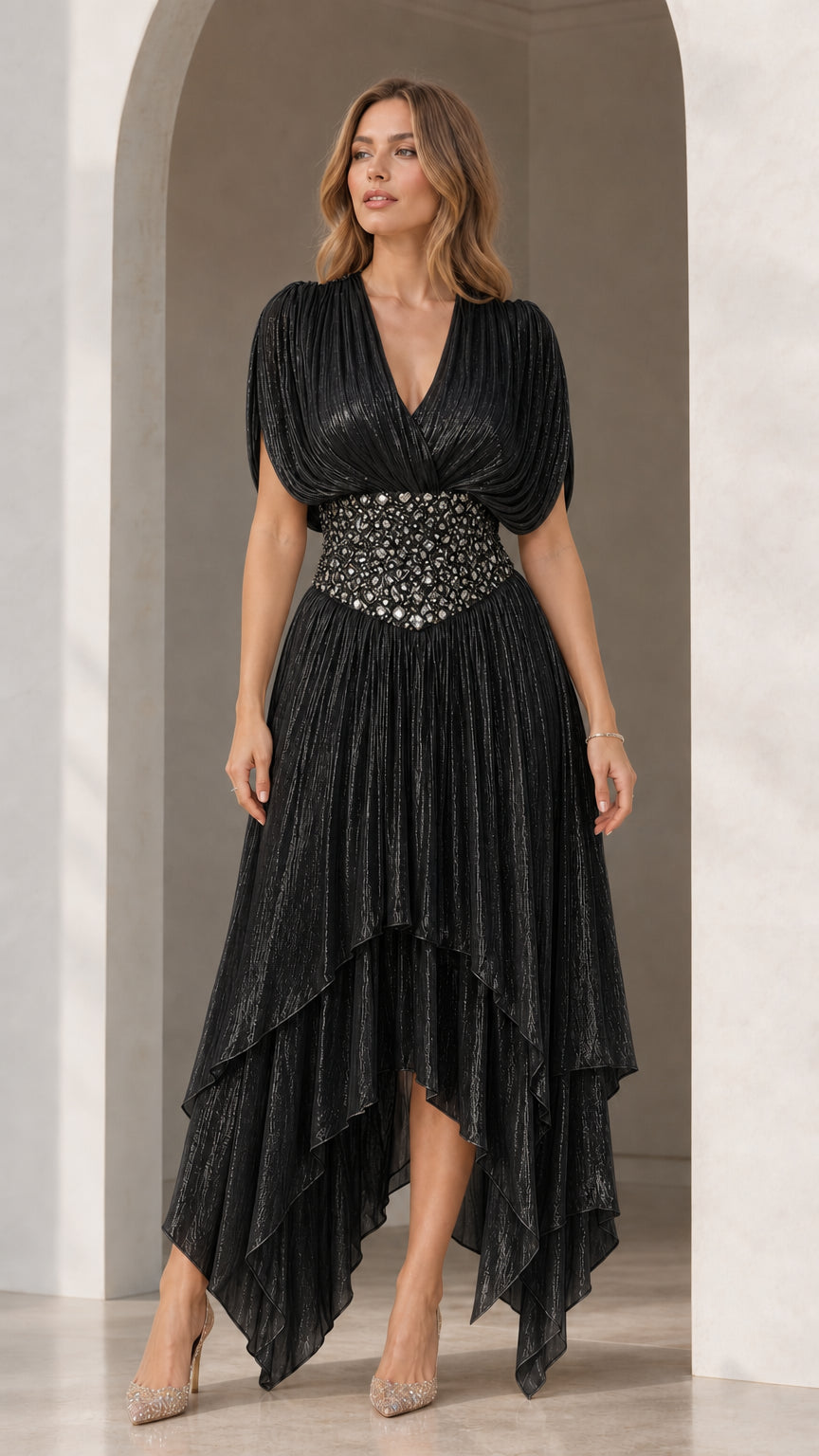 Full-length front view of Black shimmer pleated high-low evening gown