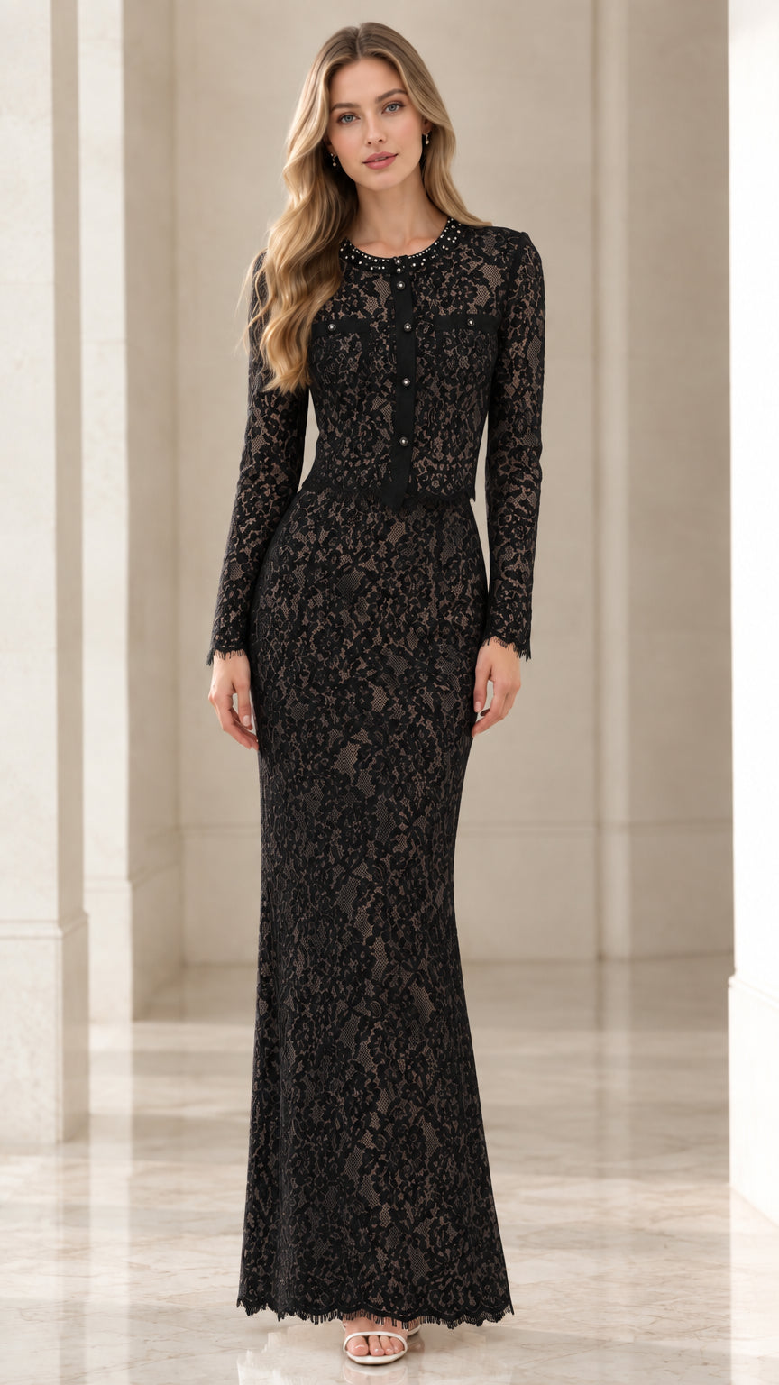 Full-length front view of black long sleeve lace formal gown