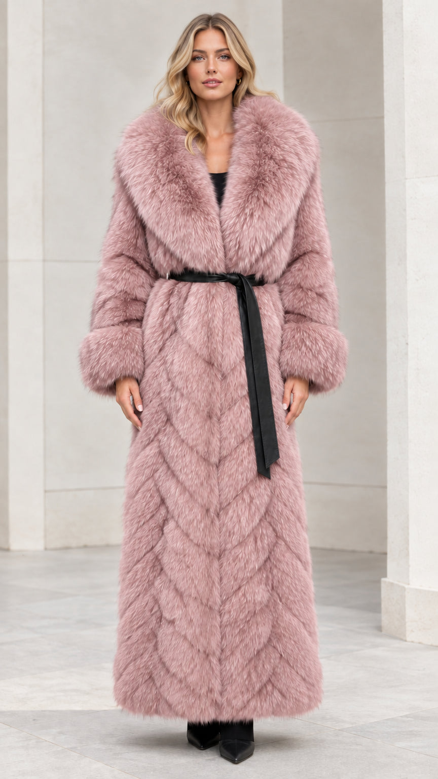 Front view of dusty pink chevron faux fur maxi coat with tie belt
