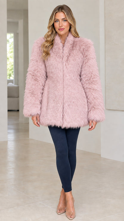 Front view of model wearing a Dusty Pink shaggy faux fur coat