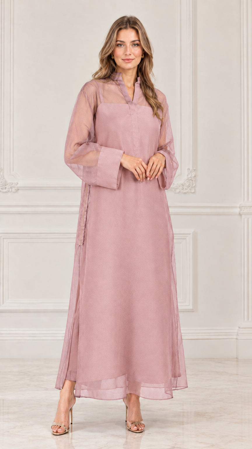 Model wearing dusty pink sheer overlay long sleeve maxi dress