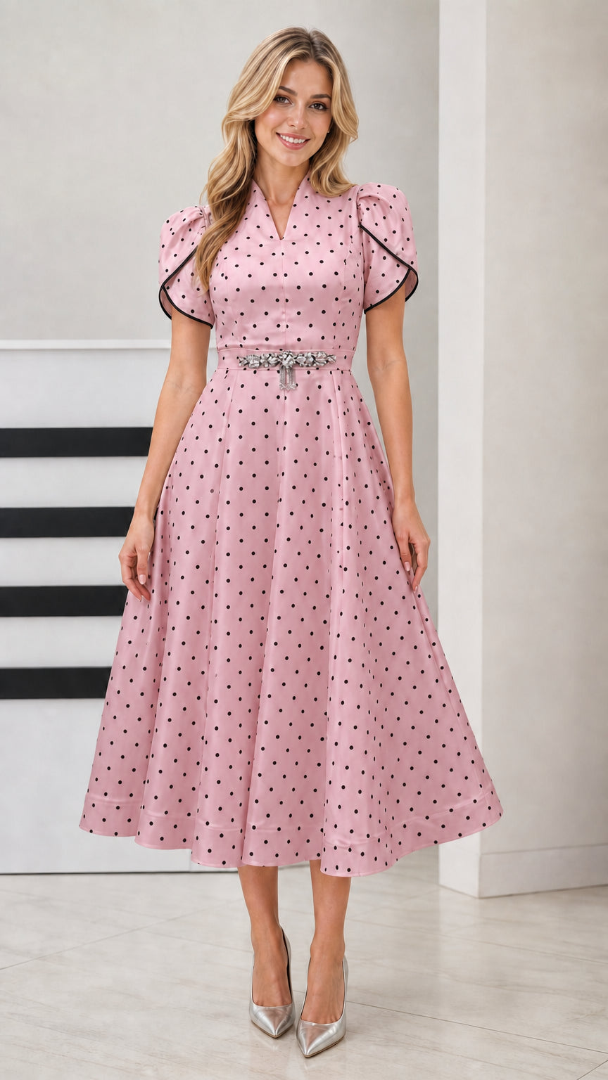 Front view of woman wearing Blush Pink polka dot V-neck flared midi dress