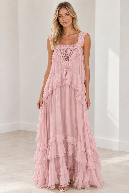Model wearing dusty pink tiered ruffle lace-up maxi dress