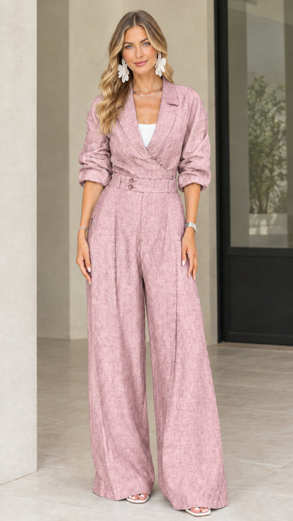 Front view of model wearing dusty pink lapel collar wide leg jumpsuit