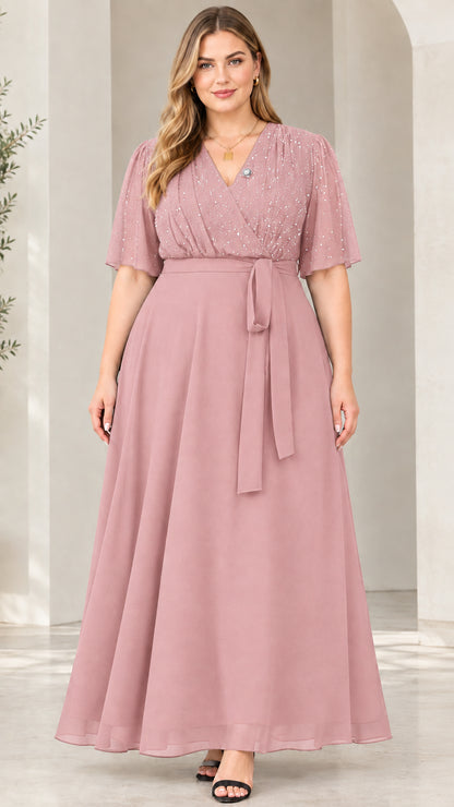 Front view of model wearing dusty rose flutter sleeve glitter evening maxi dress