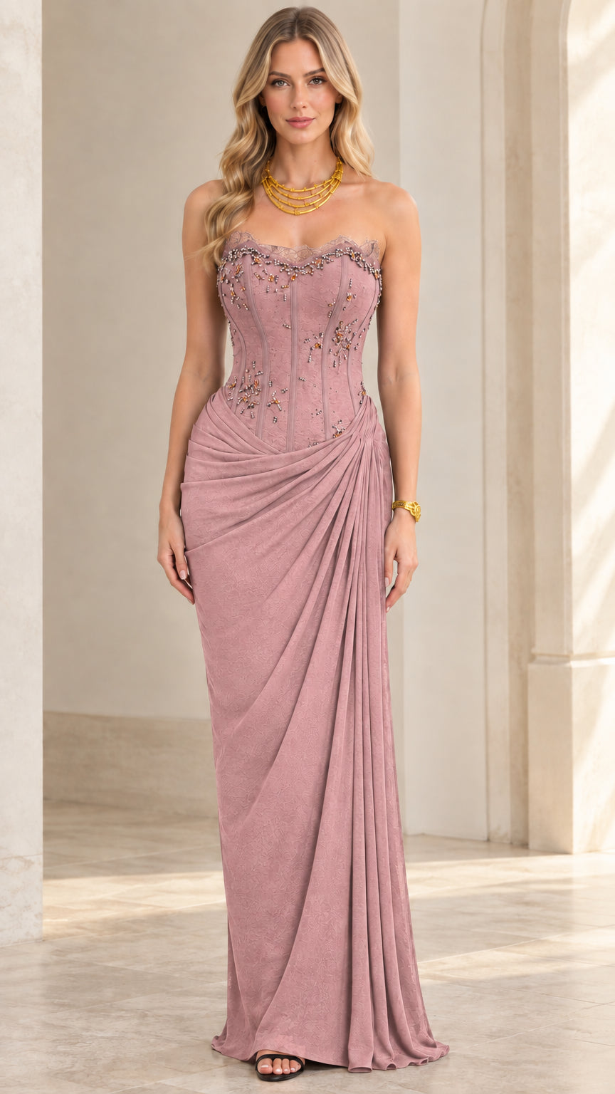 Model wearing dusty rose strapless corset draped maxi dress