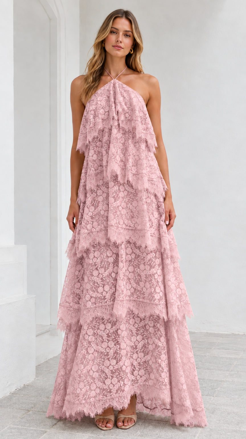 Full-length view of model wearing Blush Pink tiered floral lace halter dress