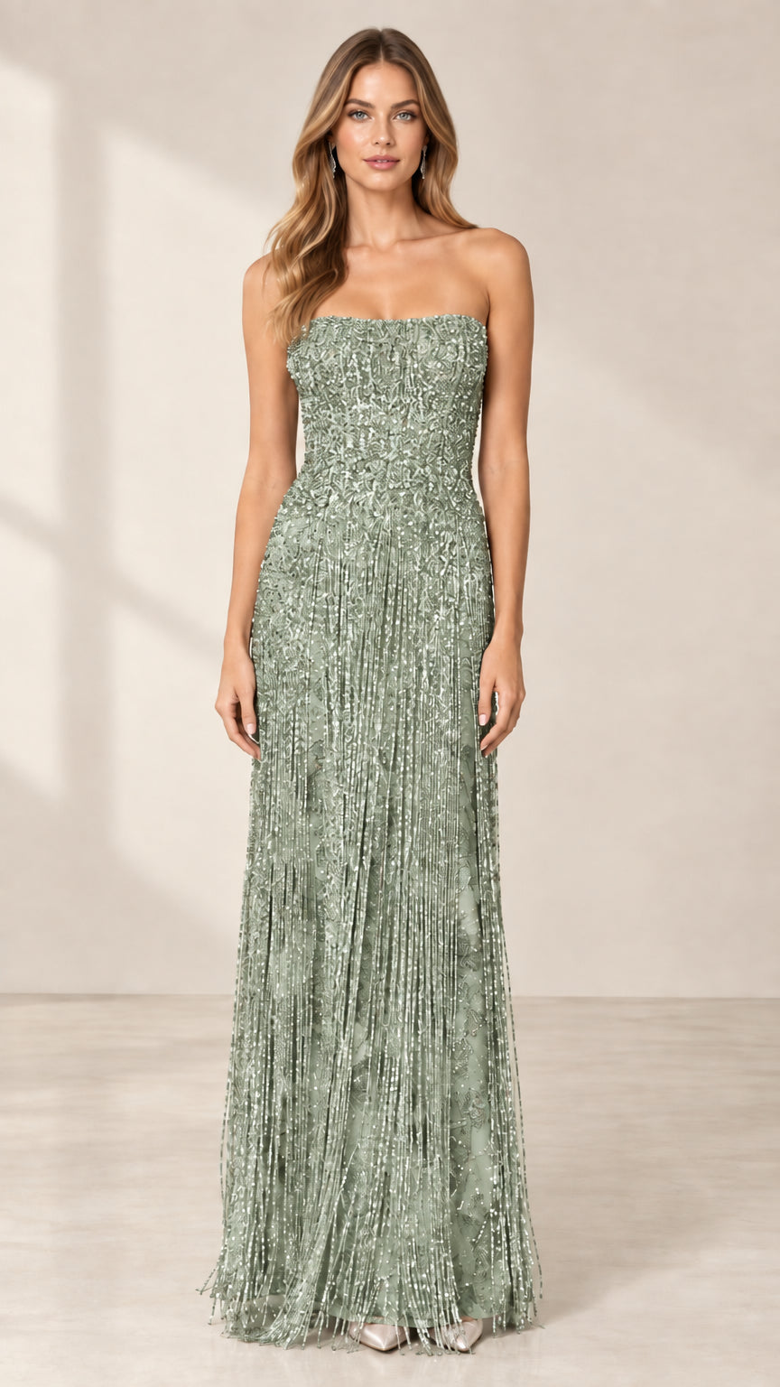 Front view of model wearing sage green strapless beaded fringe evening gown