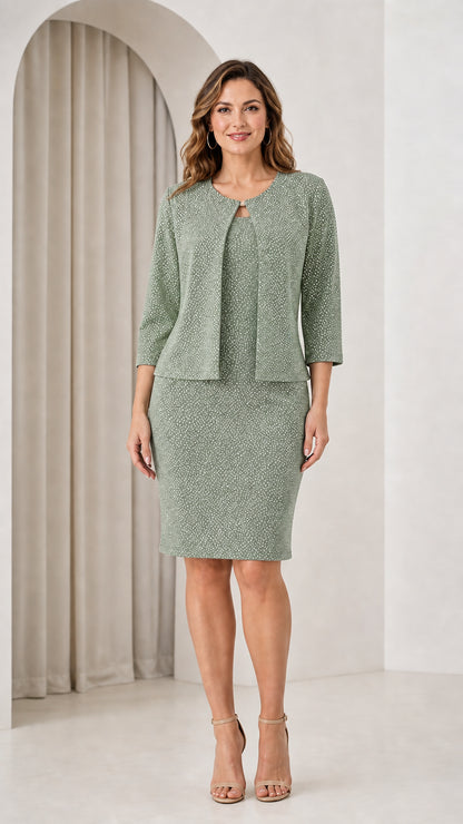 Woman wearing sage green shimmer two-piece dress and jacket set