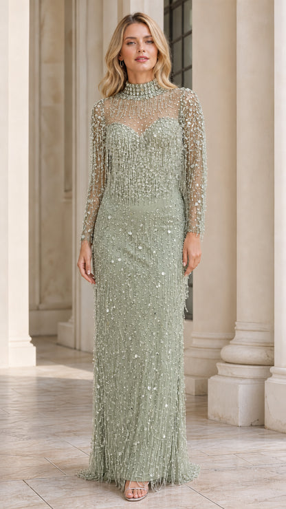 Model wearing sage green beaded long sleeve evening gown