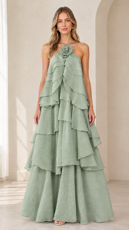 Full-length front view of model wearing Sage Green tiered rosette maxi dress