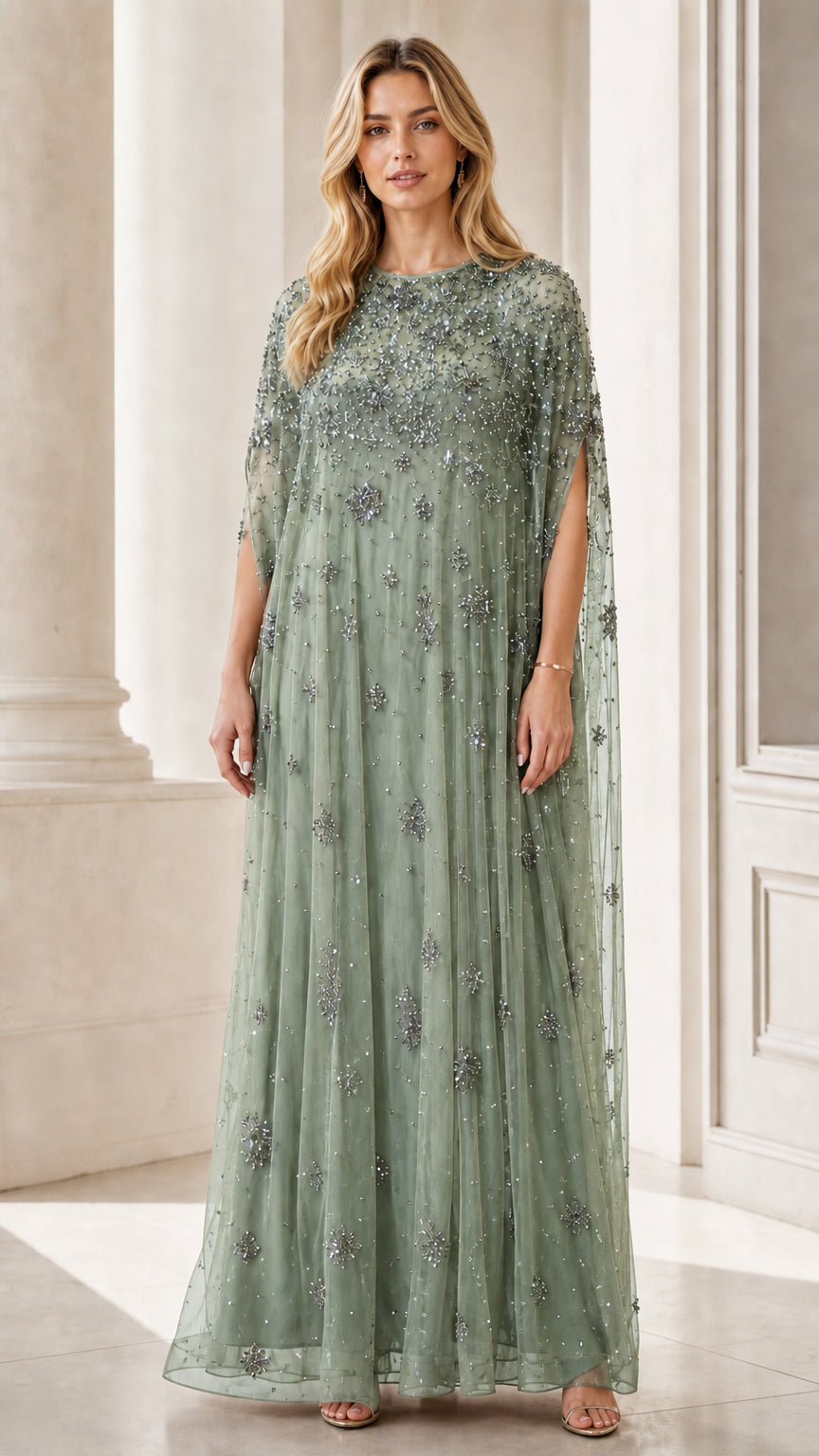 Front view of sage green beaded mesh cape maxi dress